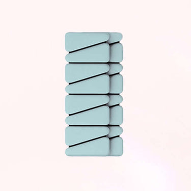 Eco-friendly Pilates Essential Kits with greyish blue resistance band and Pilates accessories for home workouts.