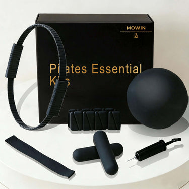 Eco-friendly Pilates Essential Kits including a Pilates ring, ball, resistant band, and more for core strength at home.